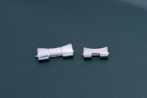 Load image into Gallery viewer, Rolex Endpieces one 257 and one 490 FCD24679
